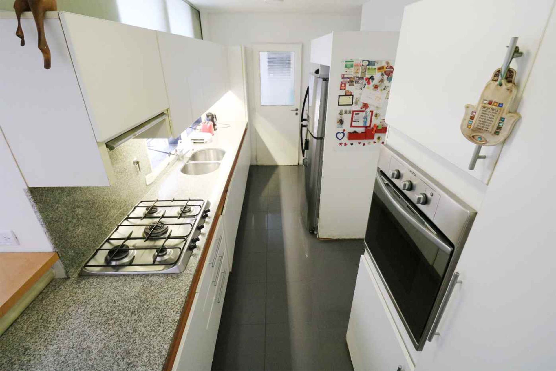 Venta piso 4 amb. con dep., patio y cochera — foto 3