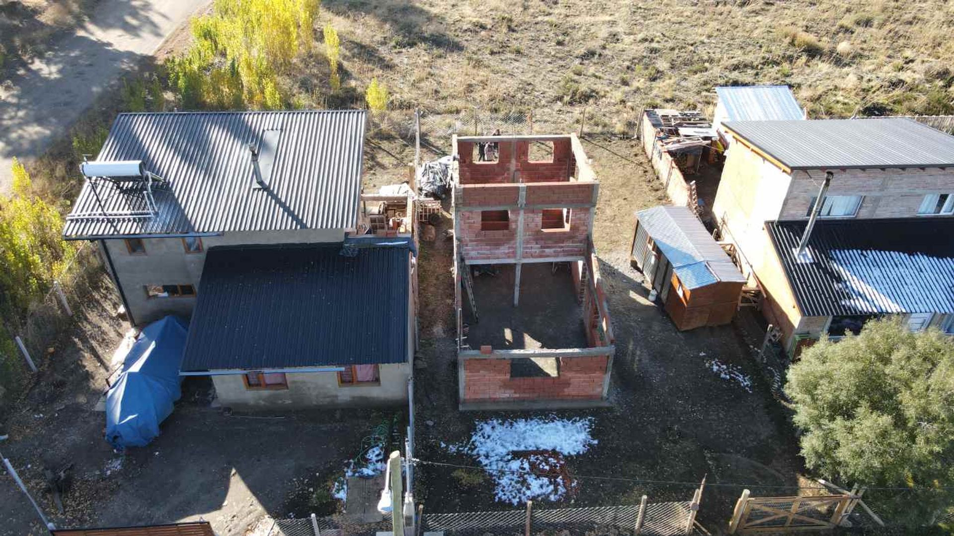 Venta lote con construcci&oacute;n a terminar Bariloche - 11