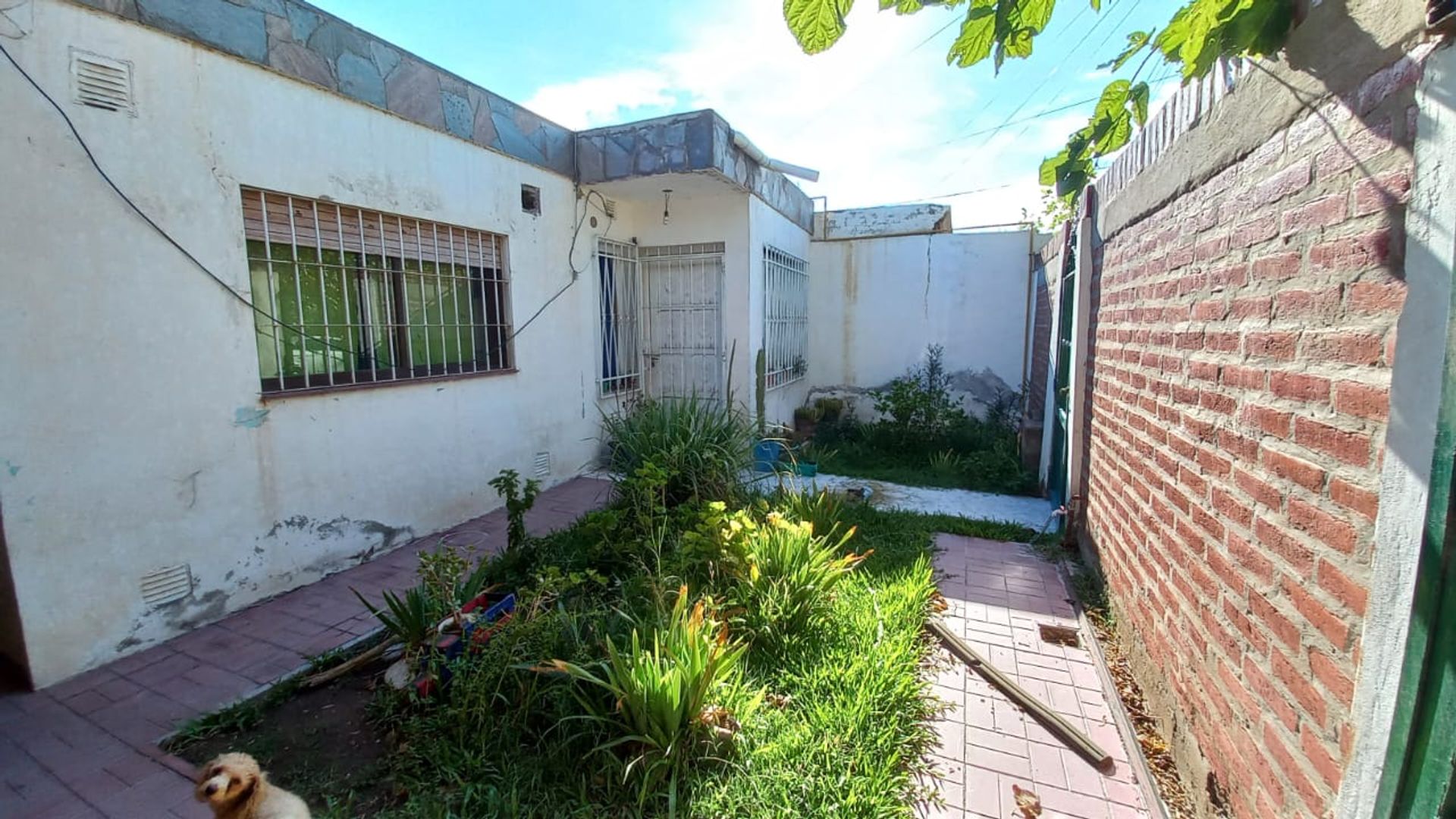 CASA CON DEPARTAMENTO BARRIO GUEMES. RAWSON - 14